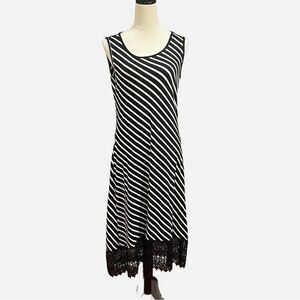 Black and white stripe dress with embroidered bottom detailing from Nina Leonard